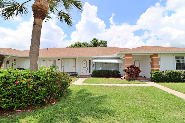 831 Timberview Dr Unit C, Fort Pierce, FL 34982 - single story home with a front lawn and stucco siding