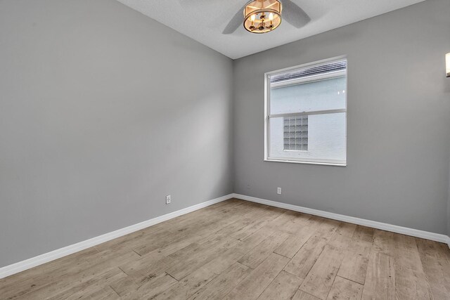 123 Canterbury Pl, Royal Palm Beach, FL 33414 - empty room featuring a ceiling fan, light wood-style flooring, and baseboards