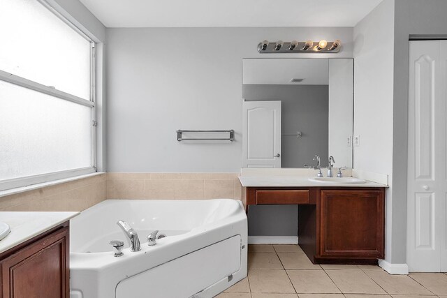 123 Canterbury Pl, Royal Palm Beach, FL 33414 - full bathroom featuring vanity, healthy amount of natural light, and tile patterned flooring