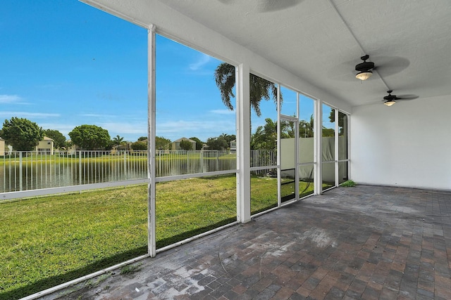 123 Canterbury Pl, Royal Palm Beach, FL 33414 - unfurnished sunroom with a water view and a ceiling fan