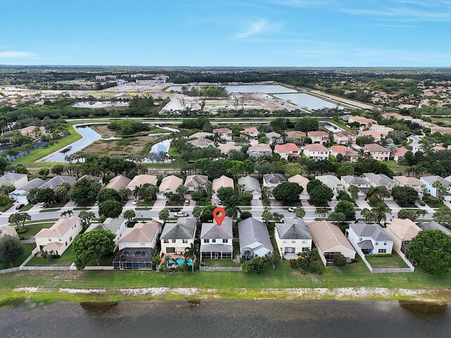 123 Canterbury Pl, Royal Palm Beach, FL 33414 - aerial perspective of suburban area with a large body of water