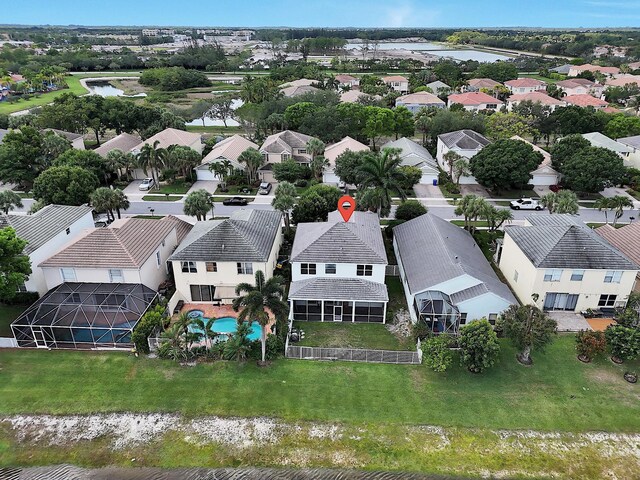 123 Canterbury Pl, Royal Palm Beach, FL 33414 - aerial view of residential area with a nearby body of water and a pool