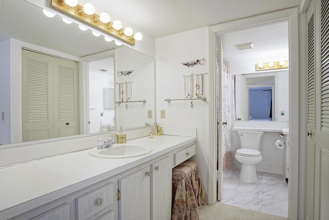 5930 Whispering Pines Way Unit C-2, Greenacres, FL 33463 - full bath featuring a closet, marble finish floors, vanity, and toilet