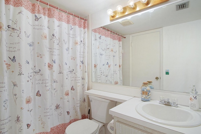 5930 Whispering Pines Way Unit C-2, Greenacres, FL 33463 - bathroom with toilet, vanity, and curtained shower