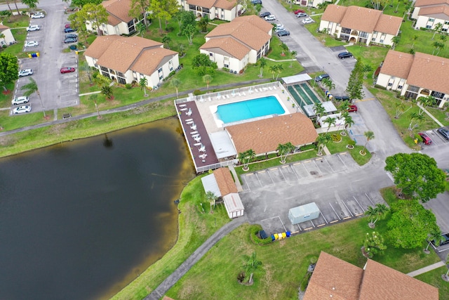 5930 Whispering Pines Way Unit C-2, Greenacres, FL 33463 - aerial view of property and surrounding area with a pool area, a nearby body of water, and nearby suburban area