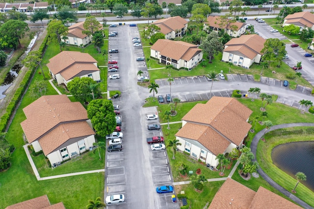 5930 Whispering Pines Way Unit C-2, Greenacres, FL 33463 - aerial view of property and surrounding area with nearby suburban area and a large body of water