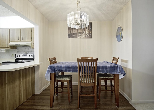 5930 Whispering Pines Way Unit C-2, Greenacres, FL 33463 - dining space with a chandelier, baseboards, wood finished floors, and a textured ceiling