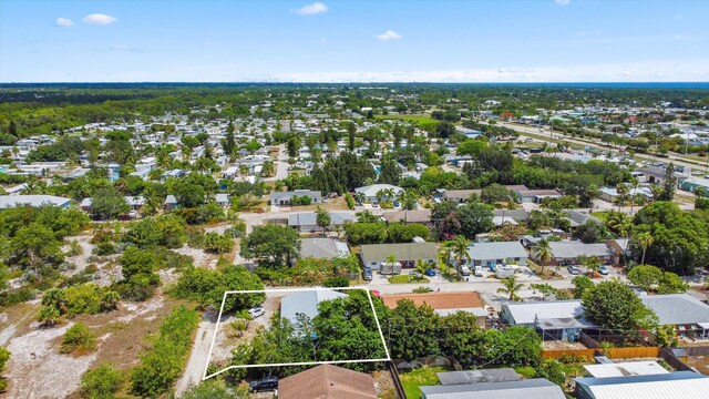 11331 SE Gold Ave, Hobe Sound, FL 33455 - aerial perspective of suburban area with property parcel outlined