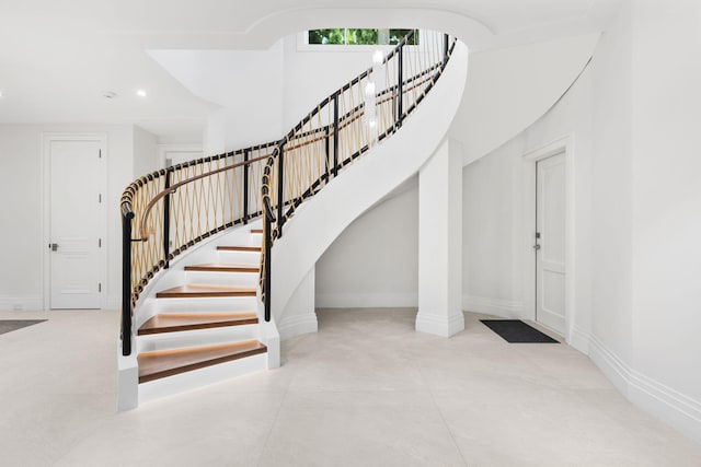526 N Ocean Blvd, Delray Beach, FL 33483 - stairs with baseboards and recessed lighting