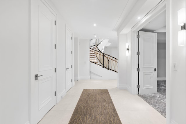 526 N Ocean Blvd, Delray Beach, FL 33483 - hall with stairs, recessed lighting, and baseboards