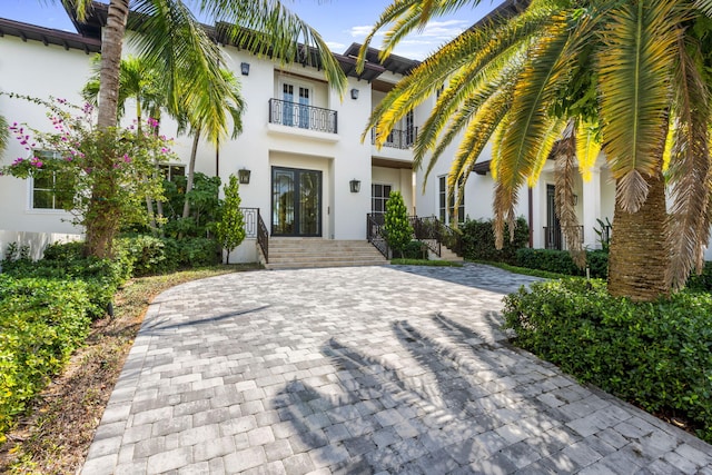 526 N Ocean Blvd, Delray Beach, FL 33483 - mediterranean / spanish home with a balcony, stucco siding, and french doors