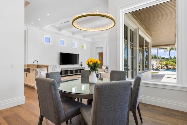 526 N Ocean Blvd, Delray Beach, FL 33483 - dining room featuring healthy amount of natural light, baseboards, wood finished floors, beamed ceiling, and recessed lighting