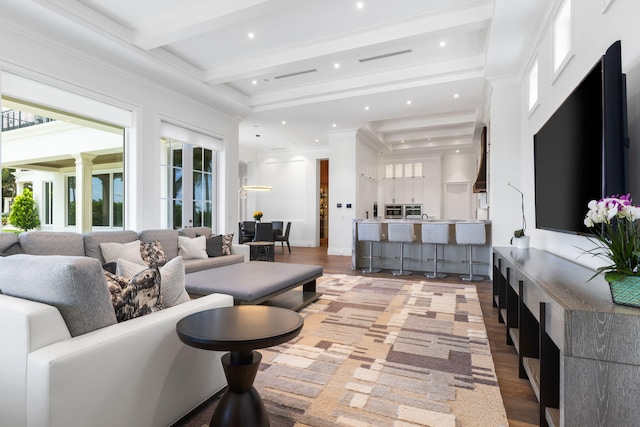 526 N Ocean Blvd, Delray Beach, FL 33483 - living room featuring light wood-style flooring, beam ceiling, recessed lighting, and crown molding