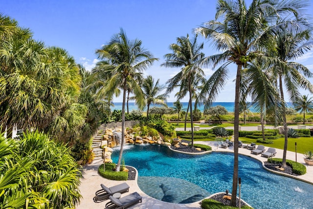 526 N Ocean Blvd, Delray Beach, FL 33483 - outdoor pool featuring a patio and a water view