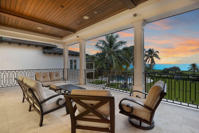 526 N Ocean Blvd, Delray Beach, FL 33483 - view of patio with an outdoor hangout area and a balcony