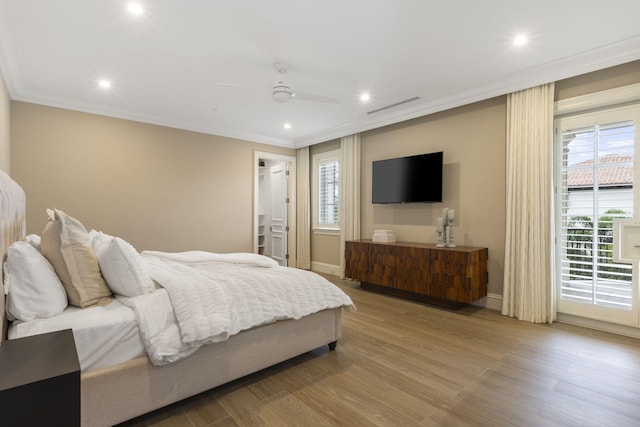 526 N Ocean Blvd, Delray Beach, FL 33483 - bedroom featuring crown molding, wood finished floors, baseboards, recessed lighting, and a ceiling fan