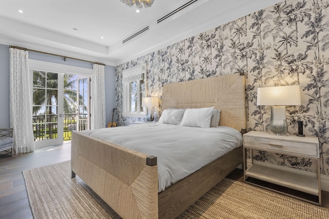 526 N Ocean Blvd, Delray Beach, FL 33483 - bedroom with wallpapered walls, access to exterior, wood finished floors, and recessed lighting