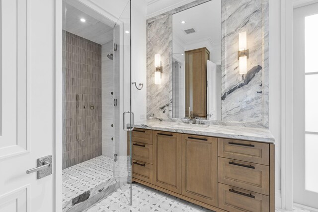 526 N Ocean Blvd, Delray Beach, FL 33483 - bathroom featuring a stall shower, vanity, crown molding, and recessed lighting