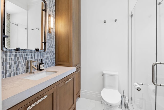 526 N Ocean Blvd, Delray Beach, FL 33483 - full bathroom featuring vanity, a stall shower, tasteful backsplash, baseboards, and toilet