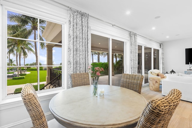 526 N Ocean Blvd, Delray Beach, FL 33483 - dining area with wood finished floors and recessed lighting
