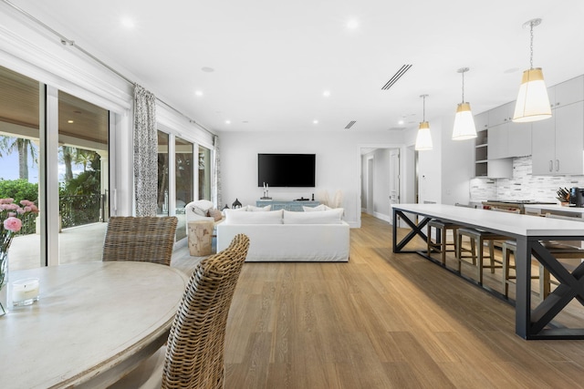 526 N Ocean Blvd, Delray Beach, FL 33483 - living room with light wood-type flooring and recessed lighting