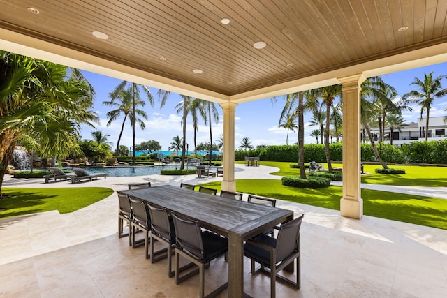 526 N Ocean Blvd, Delray Beach, FL 33483 - view of patio / terrace with outdoor dining area and an outdoor pool