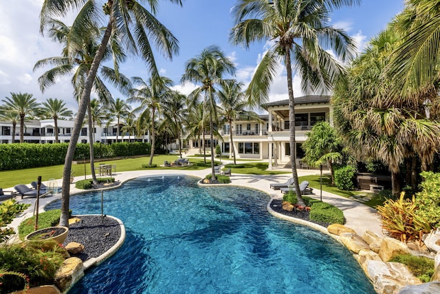 526 N Ocean Blvd, Delray Beach, FL 33483 - outdoor pool with a lawn and a patio