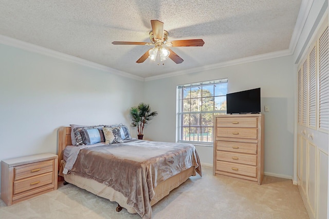 1858 SW Palm City Rd Unit 205, Stuart, FL 34994 - bedroom featuring light carpet, a closet, crown molding, a textured ceiling, and a ceiling fan