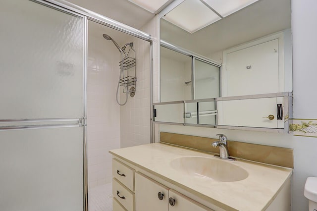 1858 SW Palm City Rd Unit 205, Stuart, FL 34994 - full bathroom with vanity, a stall shower, and toilet