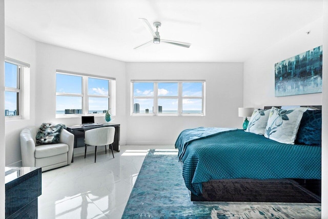 2640 Lake Shore Dr Unit 2307, Riviera Beach, FL 33404 - bedroom with multiple windows, marble finish floors, an office area, and ceiling fan