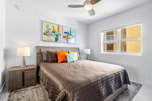 2640 Lake Shore Dr Unit 2307, Riviera Beach, FL 33404 - bedroom with baseboards and a ceiling fan