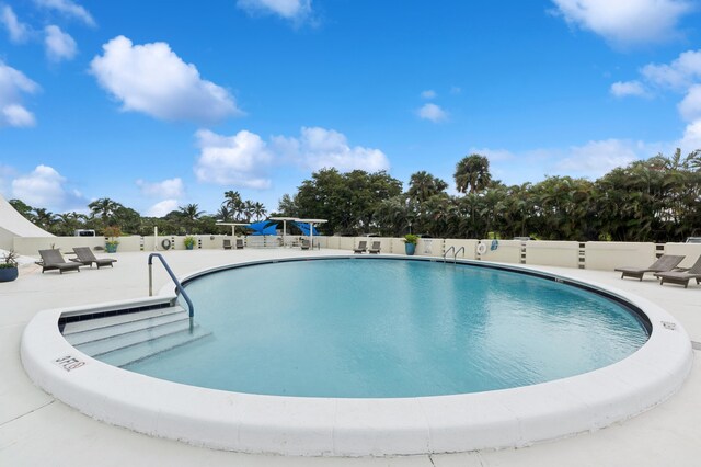 2000 Presidential Way Unit 205, West Palm Beach, FL 33401 - community pool with a patio area