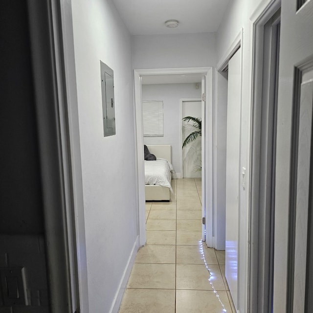 3600 Jackson St Unit 22, Hollywood, FL 33021 - corridor featuring light tile patterned floors, electric panel, and baseboards