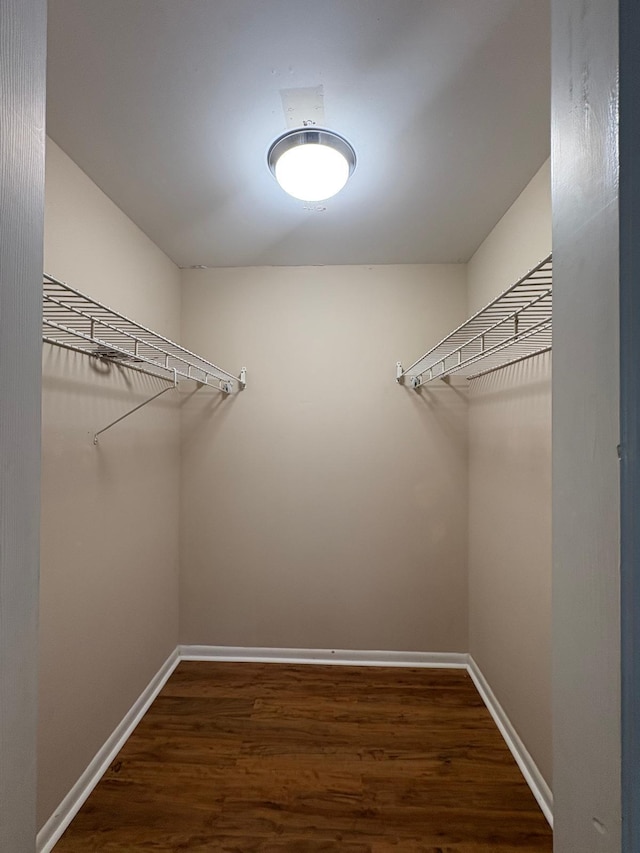 118 Yacht Club Dr Unit 7, North Palm Beach, FL 33408 - spacious closet featuring dark wood finished floors
