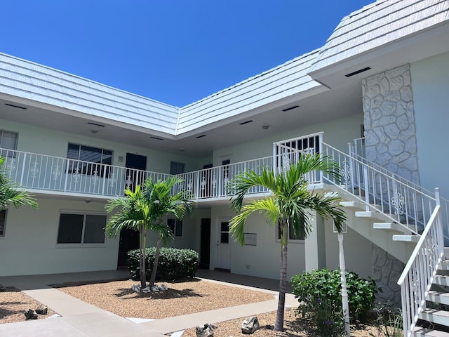 118 Yacht Club Dr Unit 7, North Palm Beach, FL 33408 - view of property with stairs