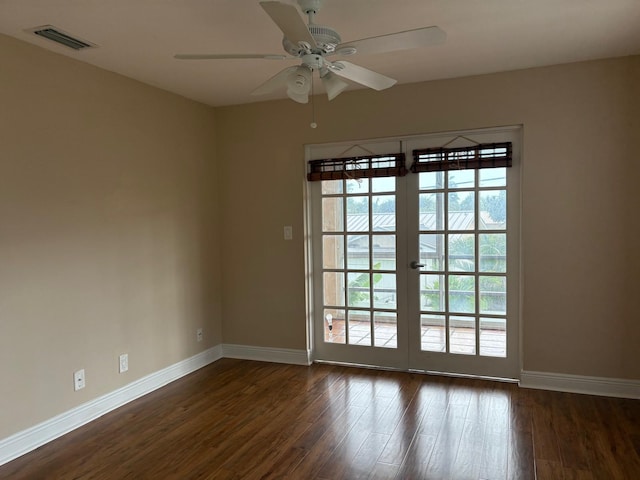 118 Yacht Club Dr Unit 7, North Palm Beach, FL 33408 - spare room featuring baseboards, plenty of natural light, and ceiling fan