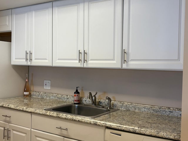 118 Yacht Club Dr Unit 7, North Palm Beach, FL 33408 - kitchen with a sink, white cabinets, light countertops, and dishwasher