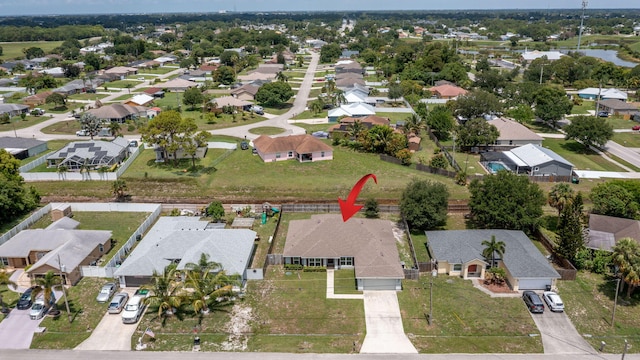 517 SW Cherryhill Rd, Port Saint Lucie, FL 34953 - aerial overview of property's location with nearby suburban area