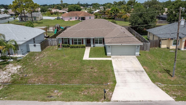 517 SW Cherryhill Rd, Port Saint Lucie, FL 34953 - ranch-style home featuring a garage, driveway, and a residential view