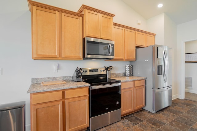 517 SW Cherryhill Rd, Port Saint Lucie, FL 34953 - kitchen with stainless steel appliances, light stone countertops, dark stone finish floors, recessed lighting, and light brown cabinets