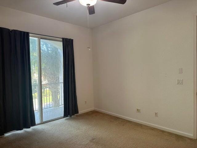 10280 SW Stephanie Way Unit 8209, Port Saint Lucie, FL 34987 - spare room with carpet flooring, ceiling fan, and baseboards