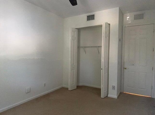 10280 SW Stephanie Way Unit 8209, Port Saint Lucie, FL 34987 - unfurnished bedroom featuring carpet floors, baseboards, a closet, and a ceiling fan