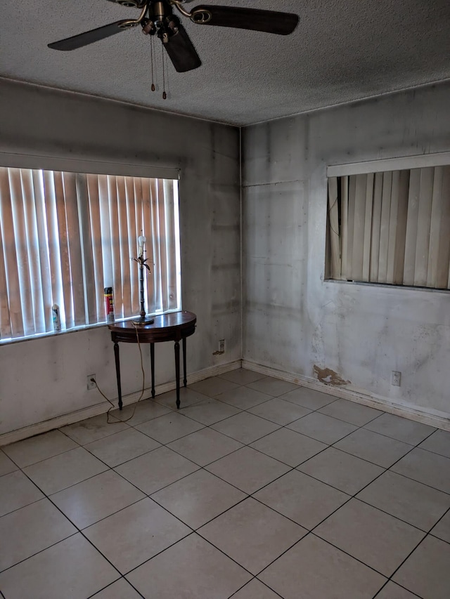 3900 Kenas St, West Palm Beach, FL 33403 - unfurnished room with ceiling fan and a textured ceiling