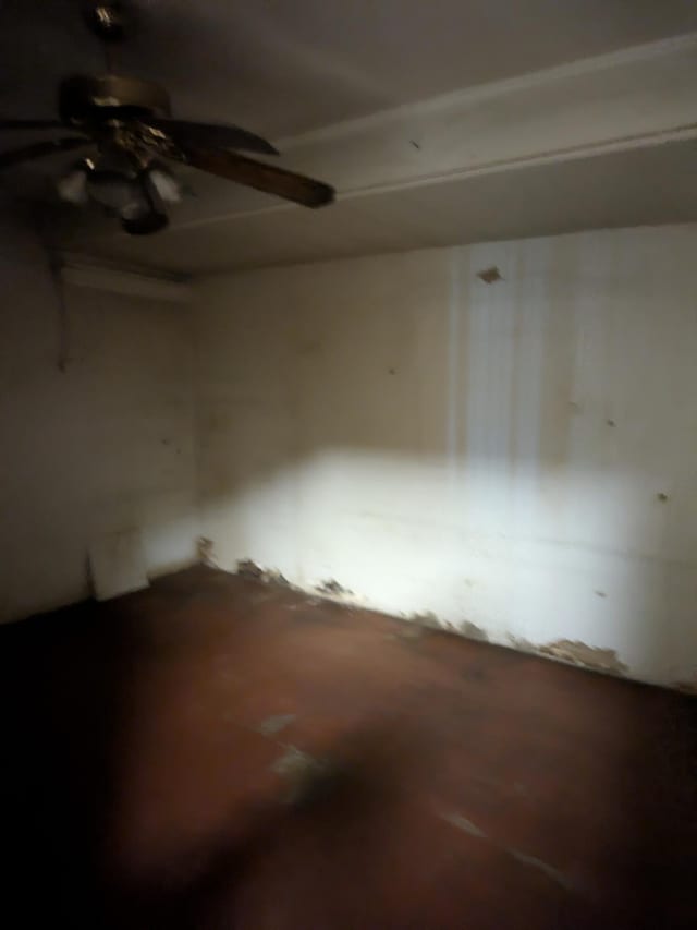 3900 Kenas St, West Palm Beach, FL 33403 - spare room featuring ceiling fan and oil tank