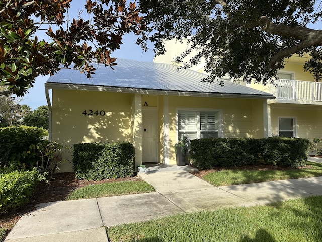 4240 Gator Trace Ave Unit 0, Fort Pierce, FL 34982 - view of front of home with metal roof