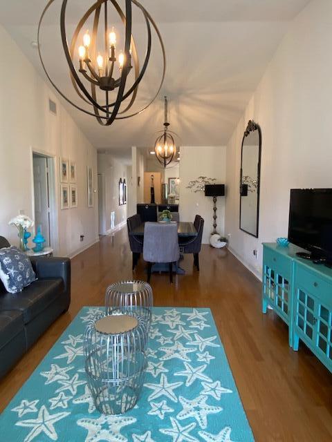 4240 Gator Trace Ave Unit 0, Fort Pierce, FL 34982 - living area featuring a chandelier and wood finished floors