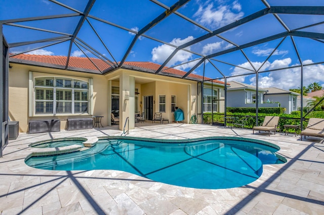 101 Sedona Way, Palm Beach Gardens, FL 33418 - view of pool with a patio, a pool with connected hot tub, and glass enclosure