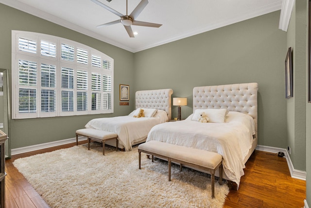 101 Sedona Way, Palm Beach Gardens, FL 33418 - bedroom with crown molding, wood finished floors, baseboards, and ceiling fan