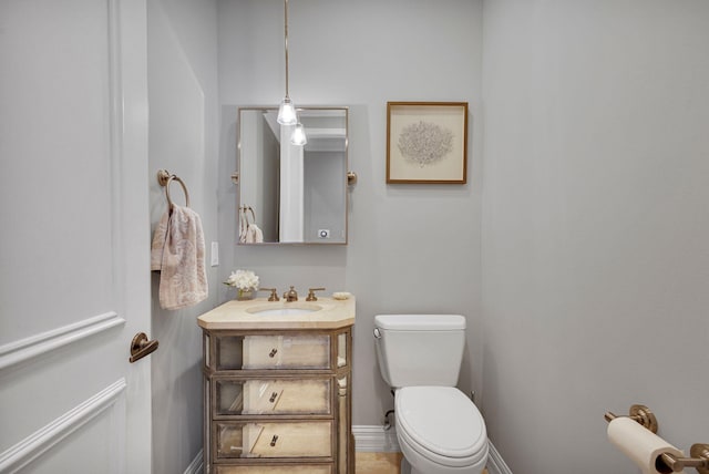 101 Sedona Way, Palm Beach Gardens, FL 33418 - bathroom with vanity, toilet, and baseboards