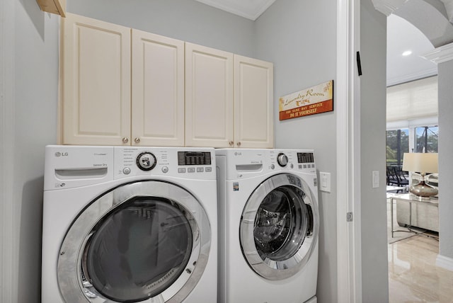 101 Sedona Way, Palm Beach Gardens, FL 33418 - washroom featuring independent washer and dryer, cabinet space, crown molding, and recessed lighting